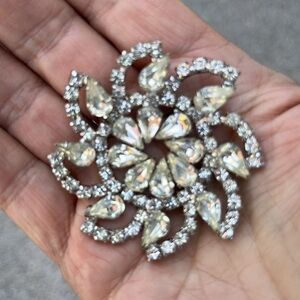 Vintage Ornate Brooch with Floral Design and Sparkling Stones